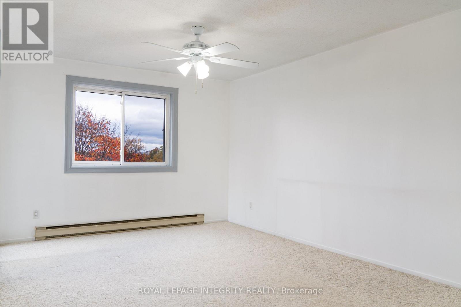 406 - 270 Brittany Drive, Ottawa, Ontario K1K 4M3 - Photo 5 - X12420396