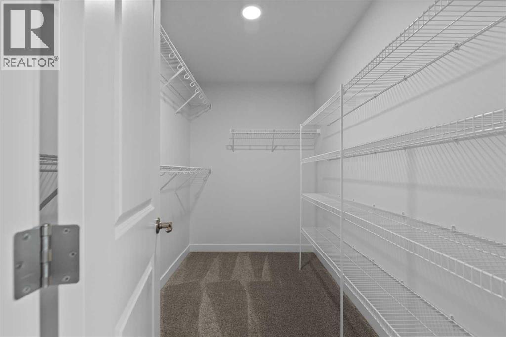 22 Emerson Crescent, Okotoks, Alberta  T1S 5W7 - Photo 27 - A2258763