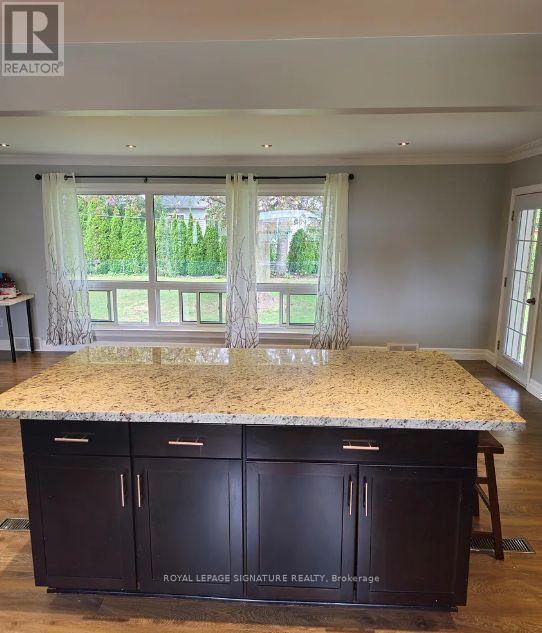 1457 Rometown Drive, Mississauga, Ontario  L5E 2T6 - Photo 5 - W12544680