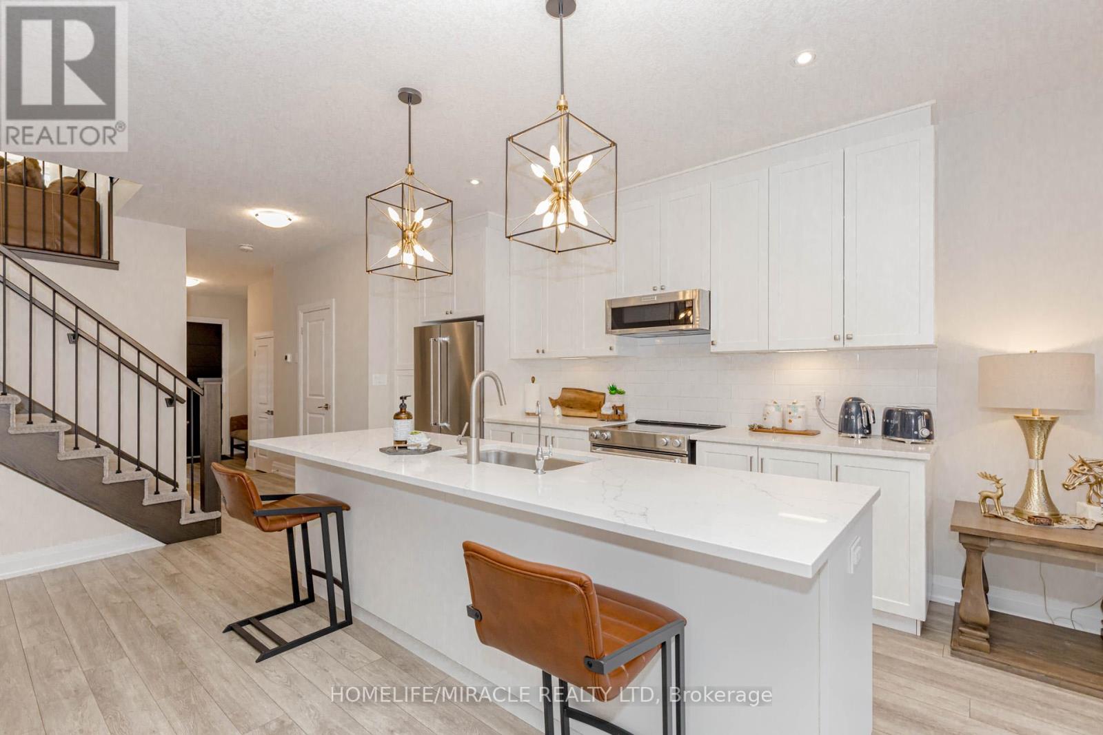 115 Monarch Woods Drive, Kitchener, Ontario  N2P 0K2 - Photo 9 - X12544612