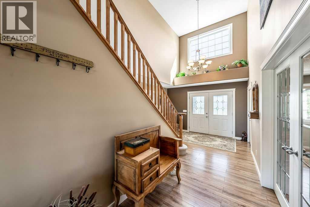 51 Norris Coulee Trail, De Winton, Alberta  T1S 5A5 - Photo 7 - A2267806