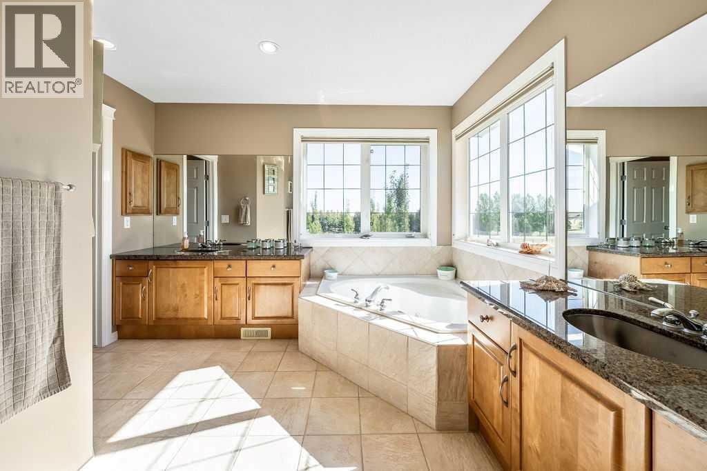 51 Norris Coulee Trail, De Winton, Alberta  T1S 5A5 - Photo 27 - A2267806