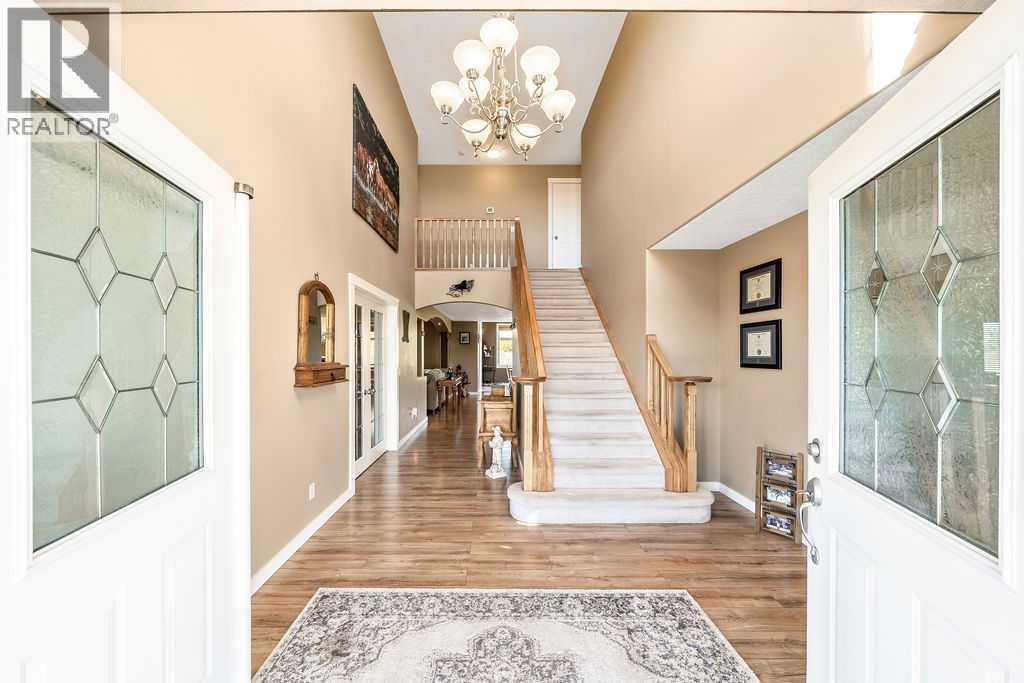 51 Norris Coulee Trail, De Winton, Alberta  T1S 5A5 - Photo 6 - A2267806