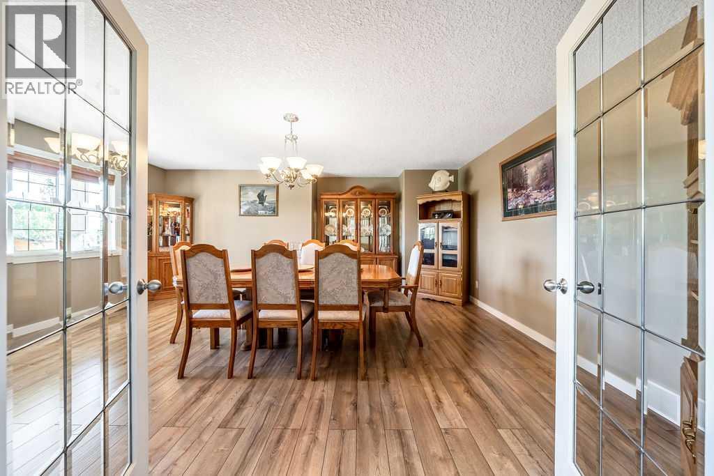 51 Norris Coulee Trail, De Winton, Alberta  T1S 5A5 - Photo 8 - A2267806