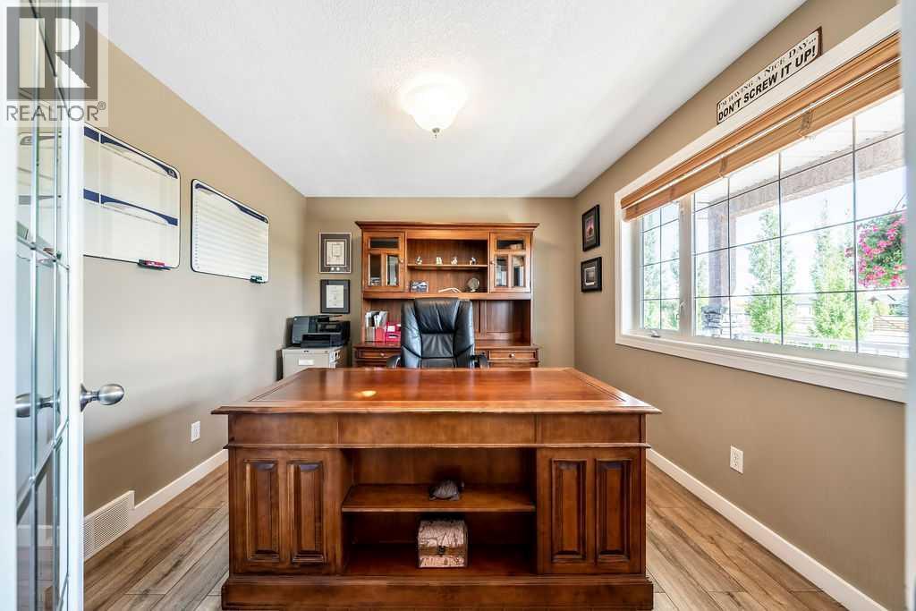 51 Norris Coulee Trail, De Winton, Alberta  T1S 5A5 - Photo 11 - A2267806