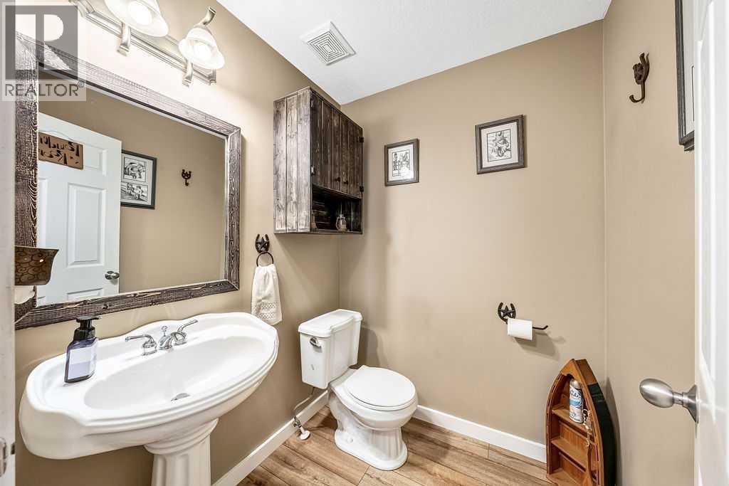 51 Norris Coulee Trail, De Winton, Alberta  T1S 5A5 - Photo 21 - A2267806