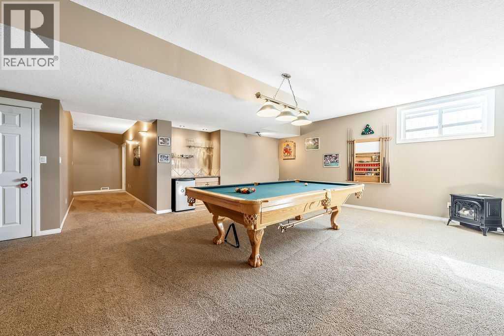 51 Norris Coulee Trail, De Winton, Alberta  T1S 5A5 - Photo 38 - A2267806