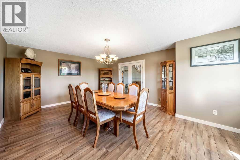 51 Norris Coulee Trail, De Winton, Alberta  T1S 5A5 - Photo 10 - A2267806