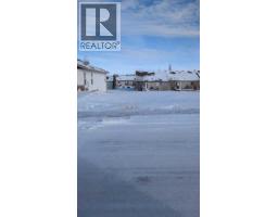 710 Whispering Greens Avenue W, Vulcan, Alberta