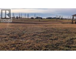 517 Whispering Greens Avenue, Vulcan, Alberta