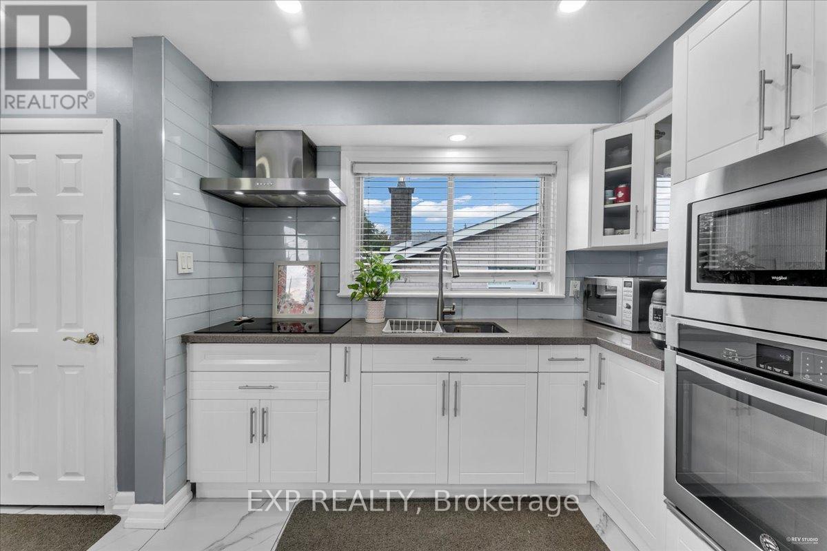 21 Kanarick Crescent, Toronto, Ontario M3L 1P3 - Photo 12 - W12545526