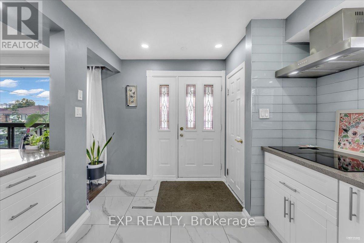 21 Kanarick Crescent, Toronto, Ontario M3L 1P3 - Photo 6 - W12545526