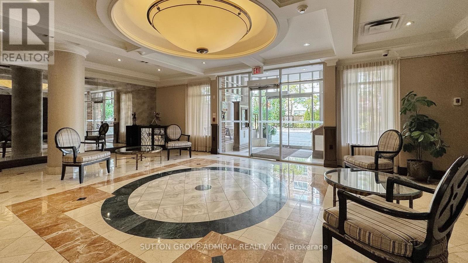 207 - 10 Old Mill Trail, Toronto, Ontario  M8X 2Y9 - Photo 3 - W12545734