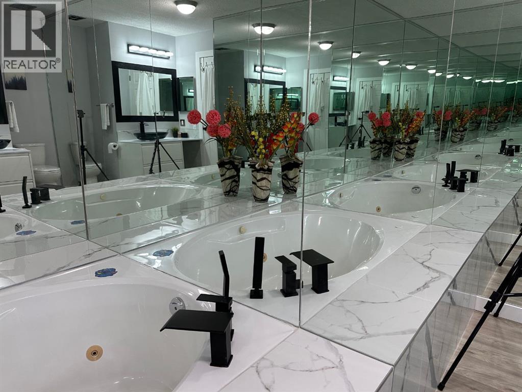 1371 Berkley Drive Nw, Calgary, Alberta  T3K 1T4 - Photo 13 - A2265900