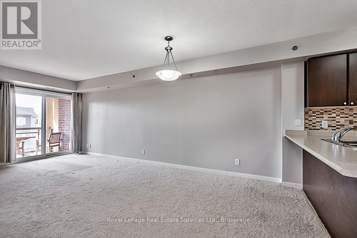 325 - 3070 Rotary Way, Burlington, Ontario  L7M 0H1 - Photo 5 - W12546050