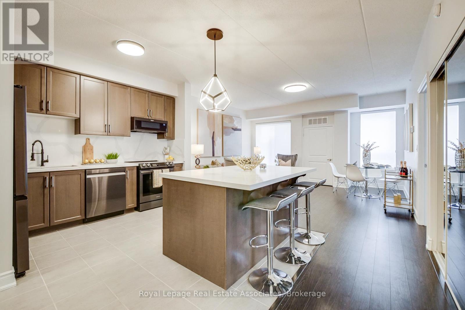 115 - 650 Sauve Street, Milton, Ontario  L9T 9A5 - Photo 3 - W12546078