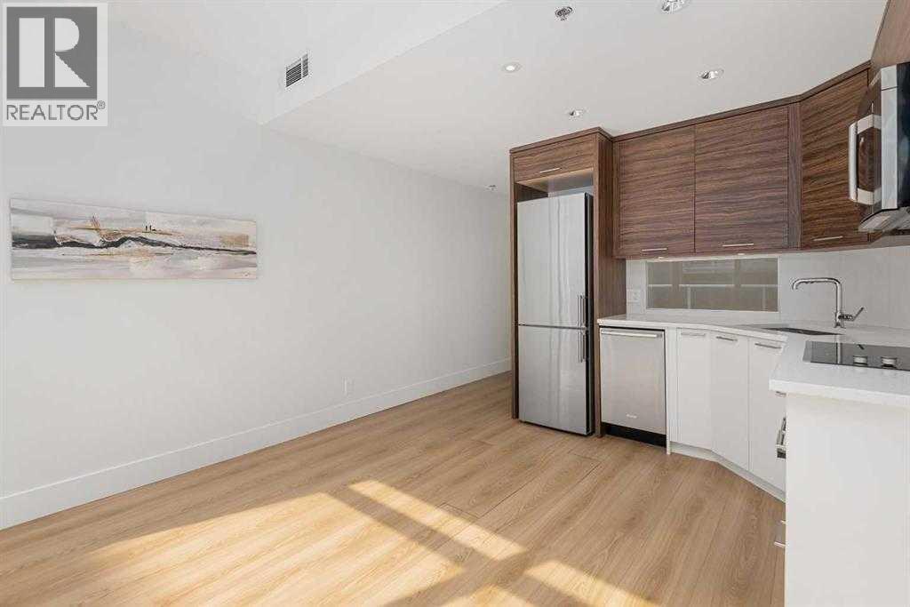 310, 1087 2 Avenue Nw, Calgary, Alberta  T3H 5L9 - Photo 8 - A2261171