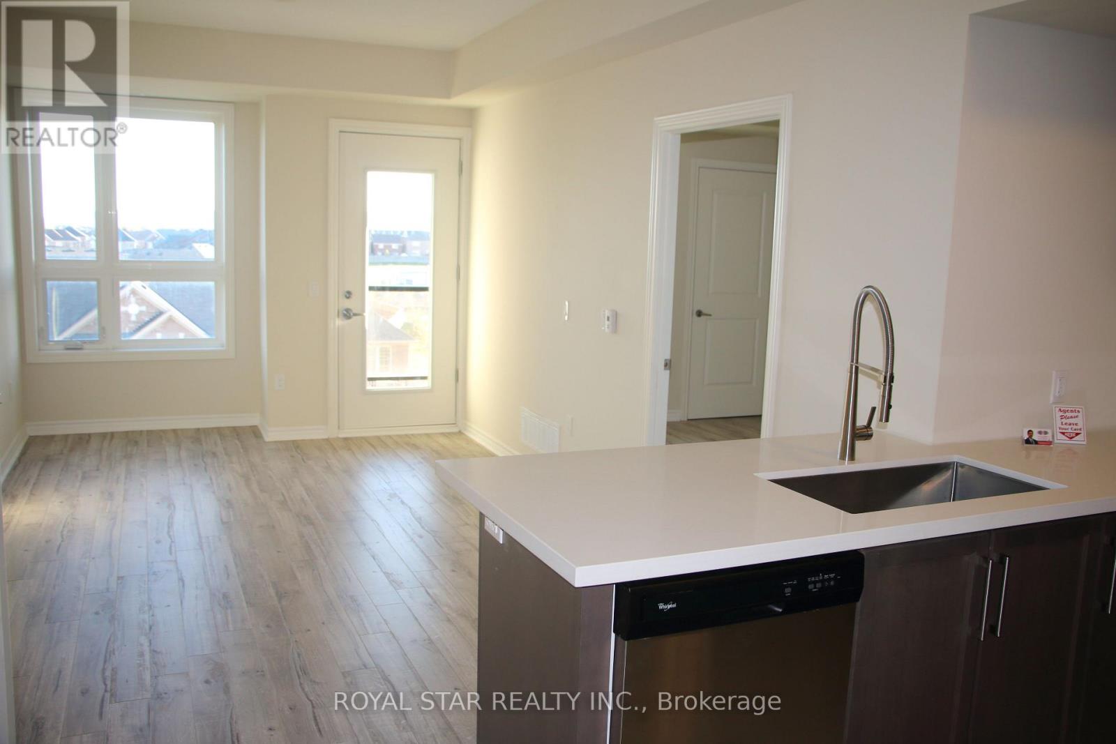 410 - 650 Sauve Street, Milton, Ontario  L9T 8M4 - Photo 5 - W12547192