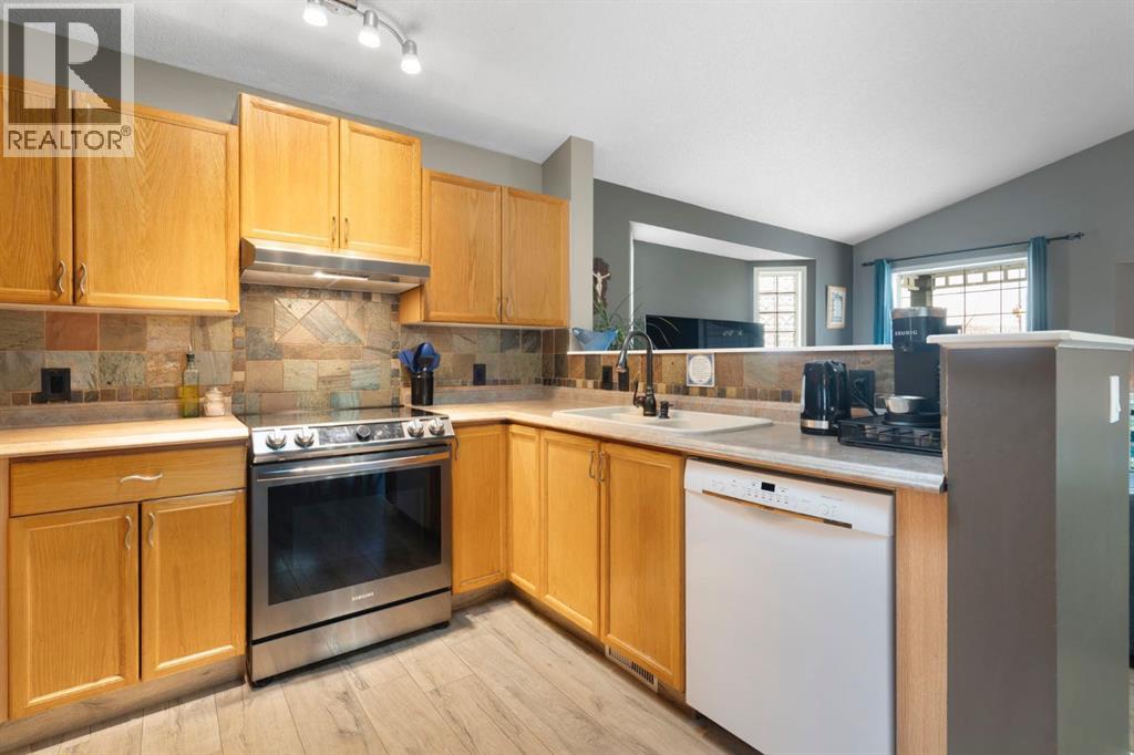 204 Hidden Spring Green Nw, Calgary, Alberta  T3A 5N4 - Photo 12 - A2270121