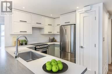 201 - 760 Lakeshore Road E, Mississauga, Ontario  L5E 1C7 - Photo 11 - W12547464