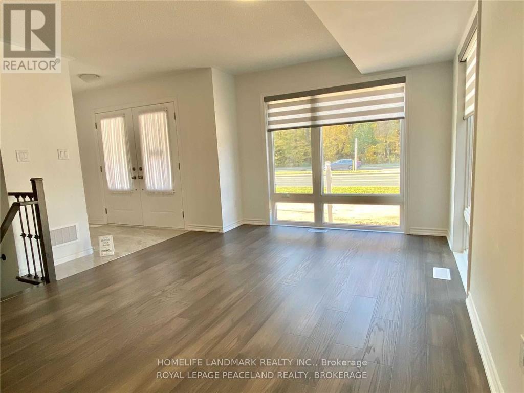 Unit 7 - 2485 Badger Crescent, Oakville, Ontario L6M 5L9 - Photo 2 - W12547554