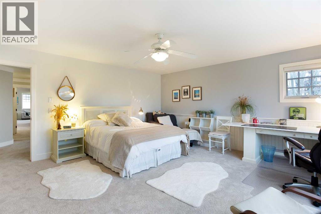 311 Rodeo Ridge, Rural Rocky View County, Alberta  T2Z 3G2 - Photo 23 - A2268978