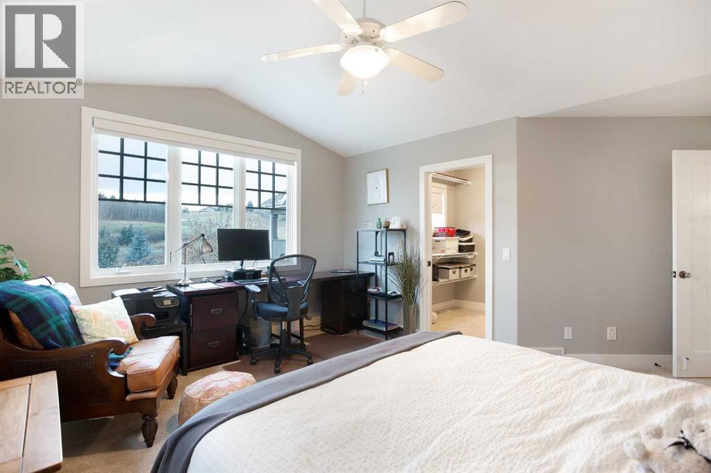 311 Rodeo Ridge, Rural Rocky View County, Alberta  T2Z 3G2 - Photo 29 - A2268978