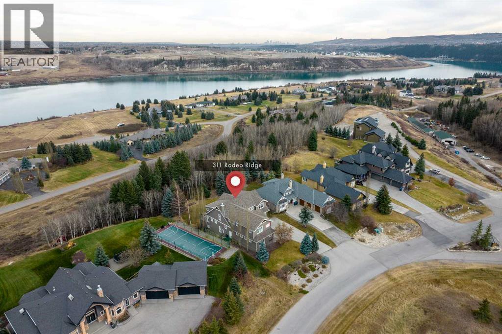 311 Rodeo Ridge, Rural Rocky View County, Alberta  T2Z 3G2 - Photo 48 - A2268978