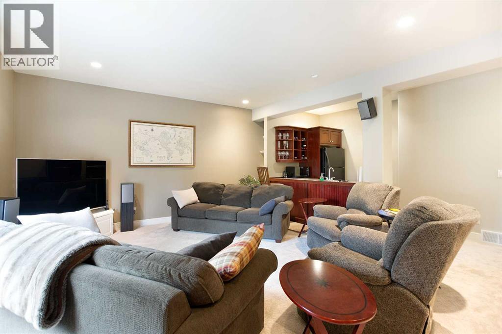 311 Rodeo Ridge, Rural Rocky View County, Alberta  T2Z 3G2 - Photo 32 - A2268978