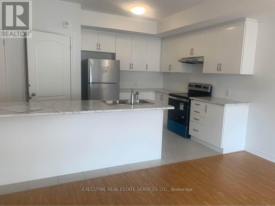 # 302 - 439 Dougall Avenue, Caledon, Ontario L7C 4L5 - Photo 2 - W12547622