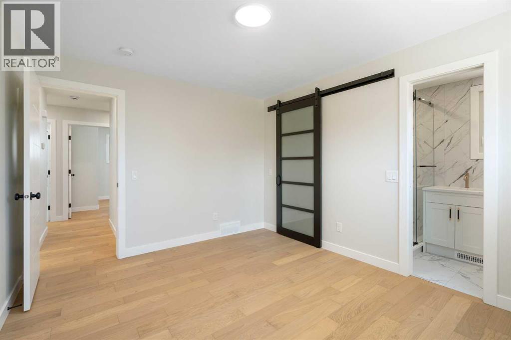 924 Canna Crescent Sw, Calgary, Alberta  T2W 1N9 - Photo 14 - A2257732