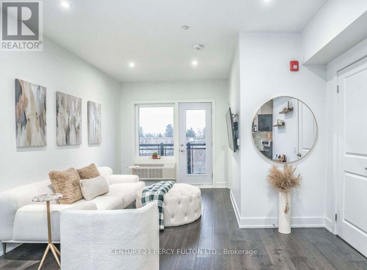 203 - 310 Broadway Avenue, Orangeville, Ontario  L9W 1L3 - Photo 2 - W12548000