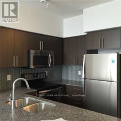 518 - 65 Speers Road, Oakville, Ontario  L6K 0J1 - Photo 2 - W12548106