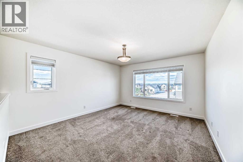 99 Lawrence Green Se, Airdrie, Alberta  T4A 3M8 - Photo 31 - A2240430