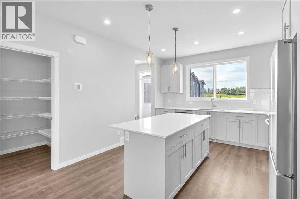 74 Wedderburn Drive, Okotoks, Alberta  T1S 5X2 - Photo 13 - A2235036