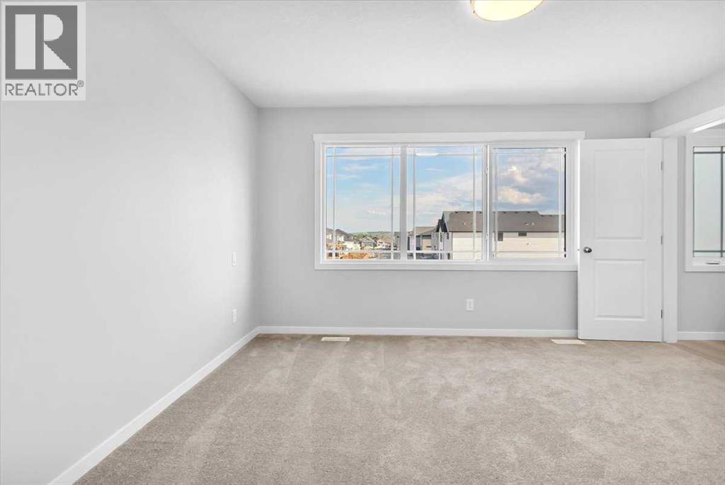 74 Wedderburn Drive, Okotoks, Alberta  T1S 5X2 - Photo 22 - A2235036