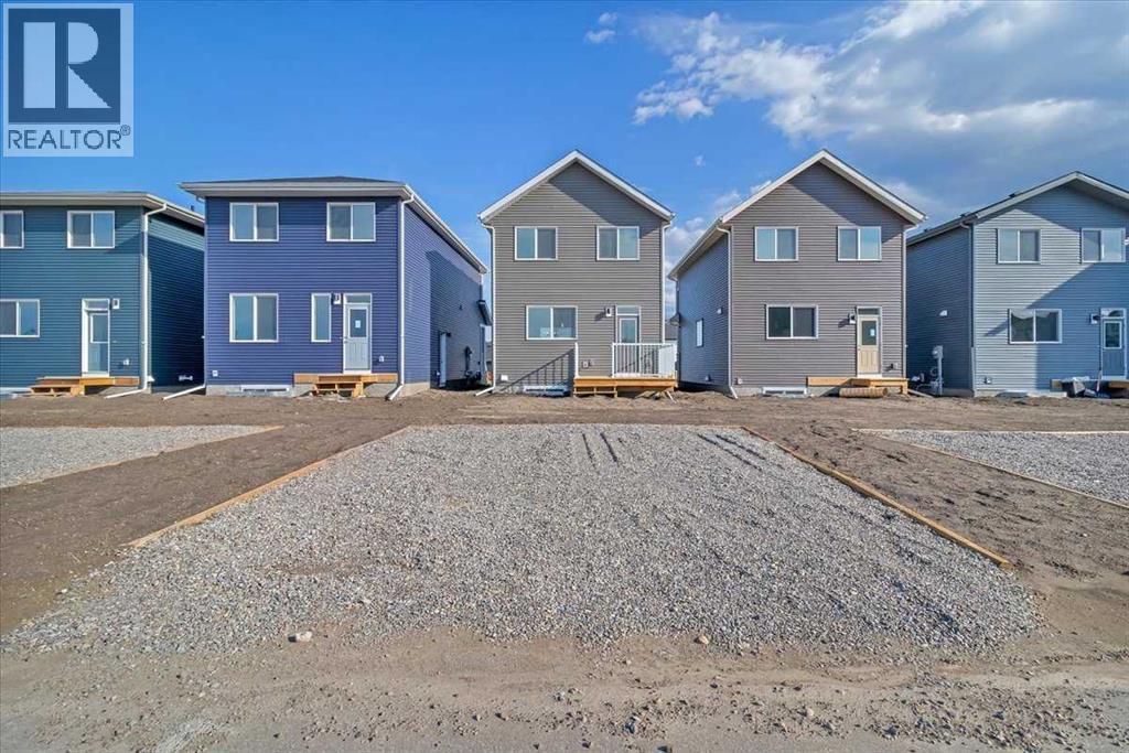 74 Wedderburn Drive, Okotoks, Alberta  T1S 5X2 - Photo 6 - A2235036