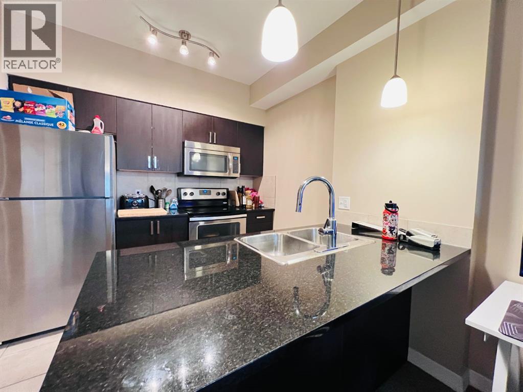 312, 117 Copperpond Common Se, Calgary, Alberta T2Z 5E2 - Photo 7 - A2264773