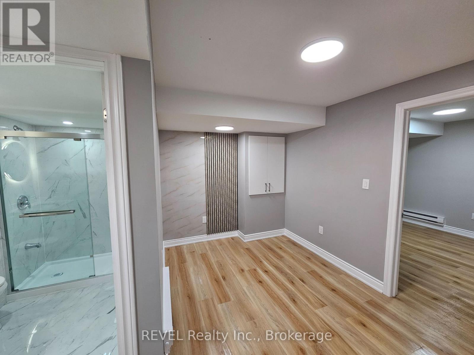 Basement - 16 Concord Drive, Thorold, Ontario L2V 0K9 - Photo 2 - X12548432