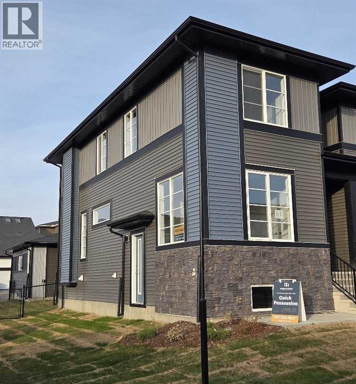 83 Lambeau Lane Se, Airdrie, Alberta  T4A 3P3 - Photo 2 - A2252044