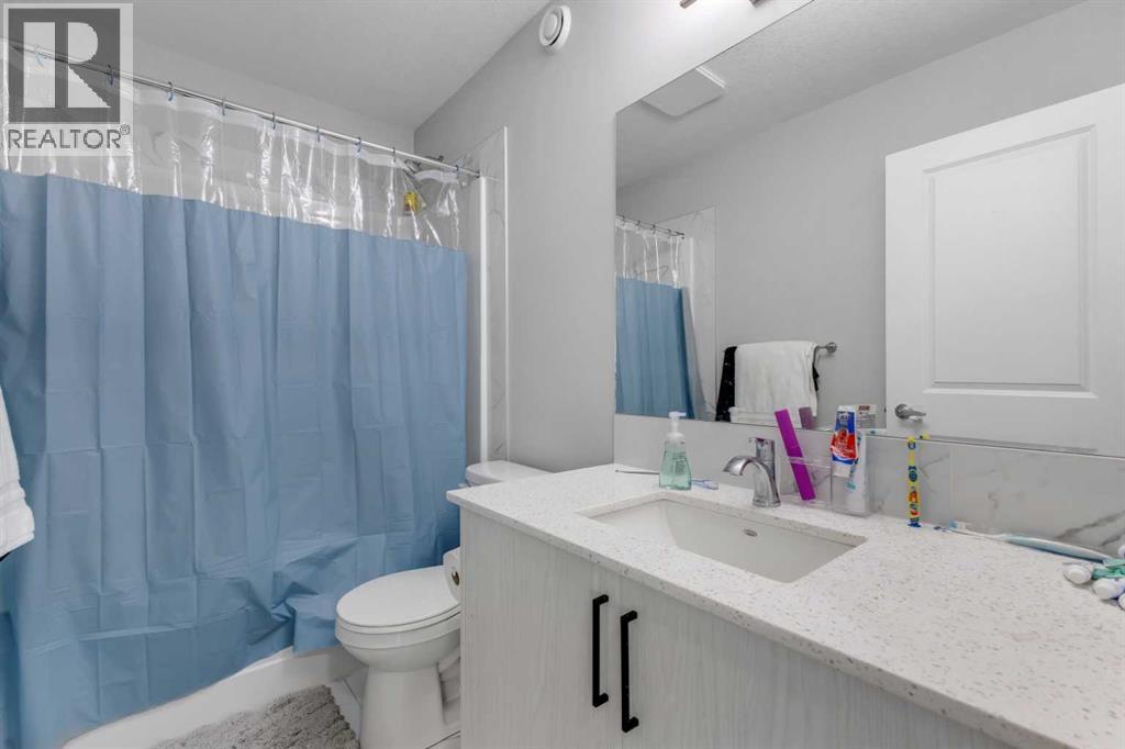 704 Creekstone Circle Sw, Calgary, Alberta  T2X 4Y6 - Photo 15 - A2270980