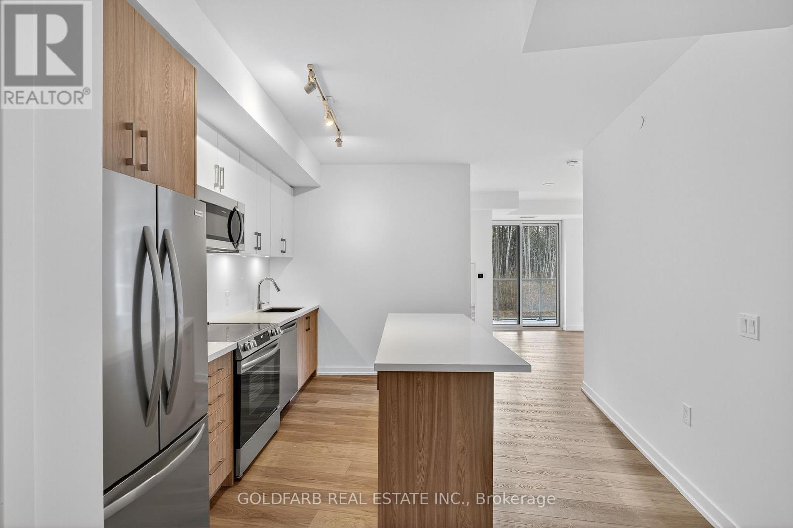 201 - 333 Sunseeker Avenue, Innisfil, Ontario  L9S 0R6 - Photo 4 - N12548808