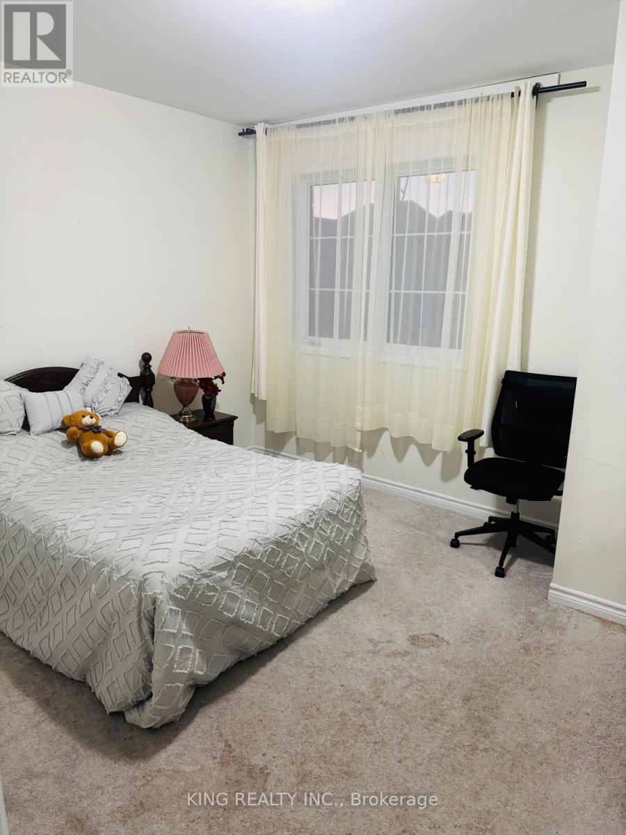 51 Eberly Woods Drive, Caledon, Ontario  L7C 4J2 - Photo 7 - W12548950