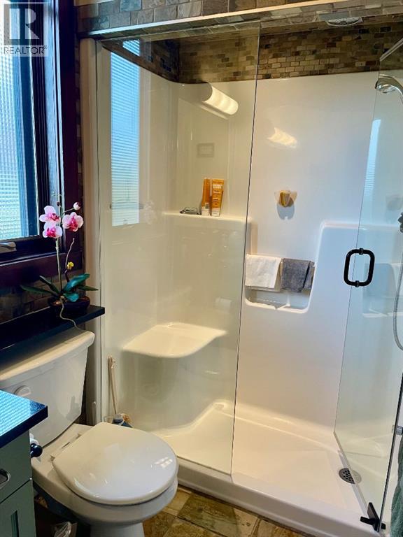 249 Cottageclub Crescent, Rural Rocky View County, Alberta  T4C 1B1 - Photo 13 - A2247550