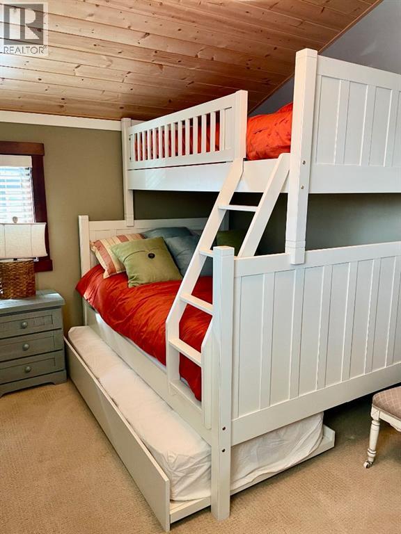 249 Cottageclub Crescent, Rural Rocky View County, Alberta  T4C 1B1 - Photo 25 - A2247550