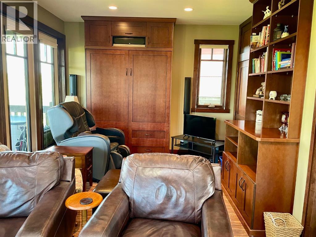 249 Cottageclub Crescent, Rural Rocky View County, Alberta  T4C 1B1 - Photo 11 - A2247550