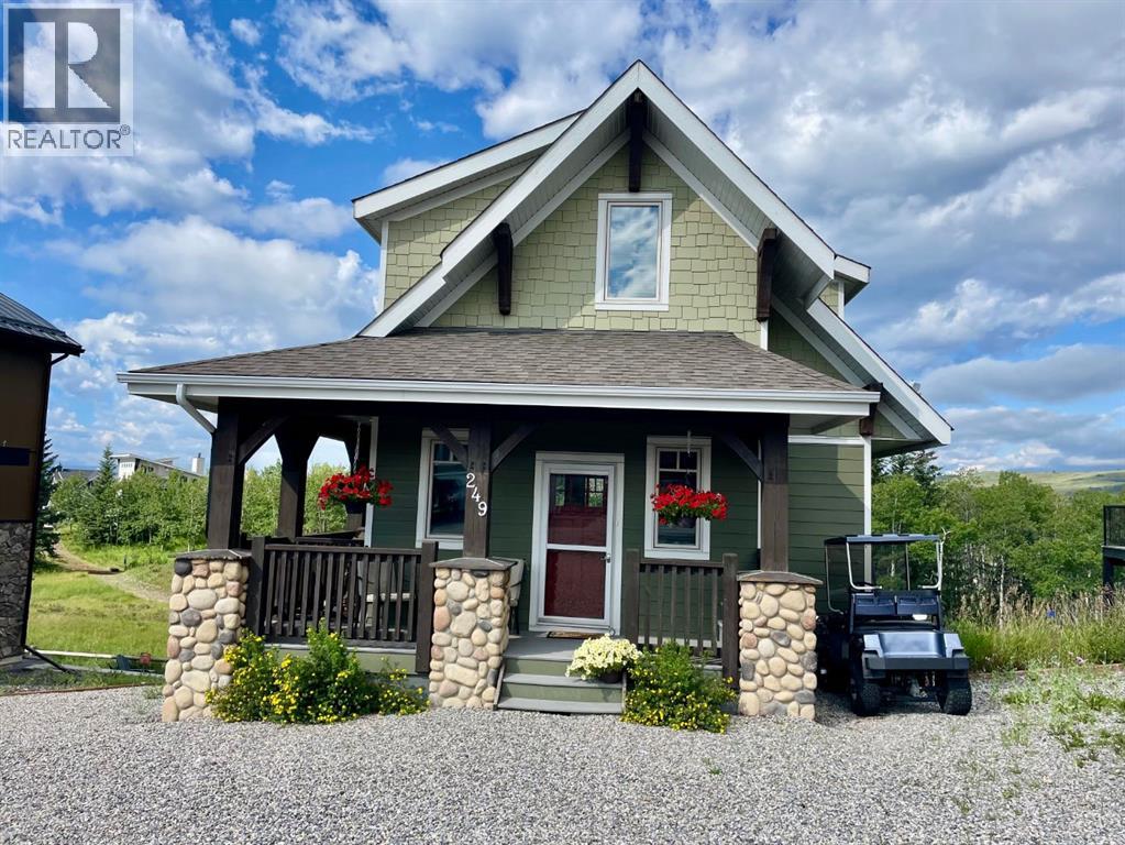 249 Cottageclub Crescent, Rural Rocky View County, Alberta  T4C 1B1 - Photo 2 - A2247550