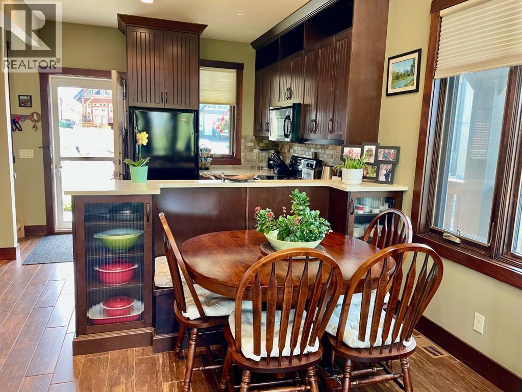 249 Cottageclub Crescent, Rural Rocky View County, Alberta  T4C 1B1 - Photo 6 - A2247550