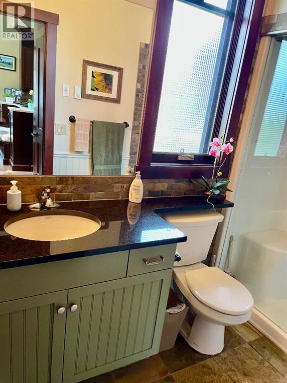 249 Cottageclub Crescent, Rural Rocky View County, Alberta  T4C 1B1 - Photo 12 - A2247550