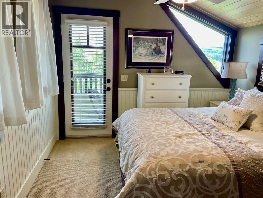 249 Cottageclub Crescent, Rural Rocky View County, Alberta  T4C 1B1 - Photo 20 - A2247550